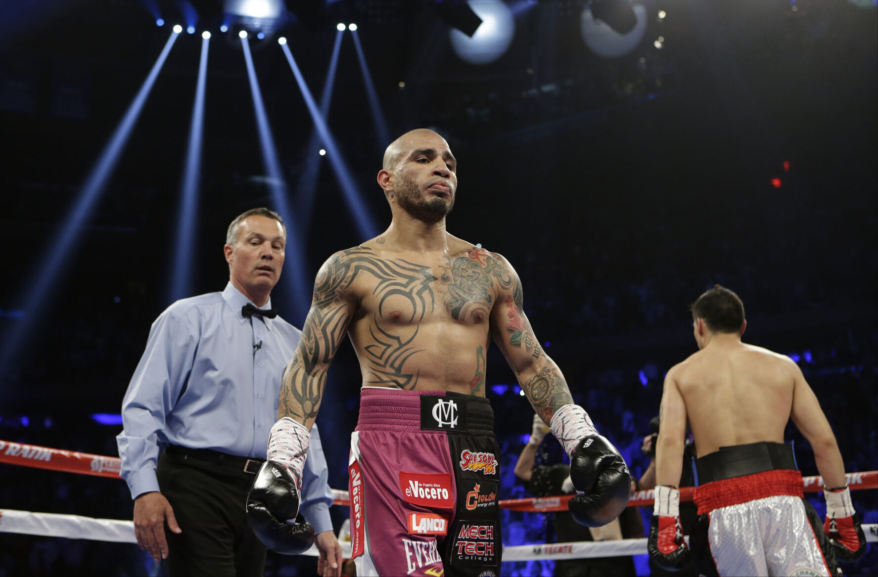 2014: Miguel Cotto becomes first Puerto Rican fighter to win world titles in four weight divisions